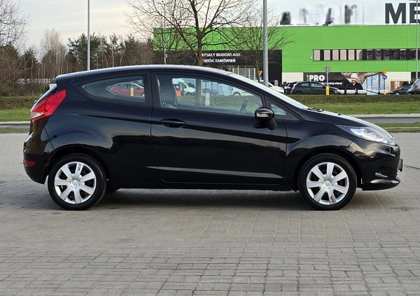 Ford Fiesta cena 16900 przebieg: 180000, rok produkcji 2009 z Bełchatów małe 254